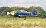 G-OUGH @ EGFH - Resident Yak-52 returning to base. - by Roger Winser