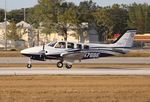 N476BE @ KORL - Baron 58 zx - by Florida Metal