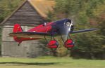 G-TATR @ EGTH - The Travel Air Racer lifts off for the admiring crowds at the Vintage Airshow 2023 at Old Warden - by Chris Holtby