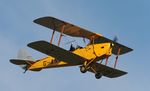 G-ANKK @ EGTH - Flypast with a wave to the crowd from the pilot at the Vintage Airshow, Old Warden 2023 - by Chris Holtby