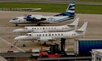 UR-CQE @ EGBB - At Birmingham Airport - by Terry Fletcher
