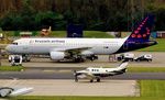 OO-TCV @ EGBB - At Birmingham - by Terry Fletcher
