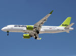 YL-AAS @ LEBL - Landing rwy 24R - by Shunn311