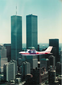 N1944Q - Flying up the Hudson River past the World Trade Center in New York City. - by Jack Deschene
