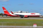N379CX @ KMIA - Nice bright red NAC B763F departing MIA - by FerryPNL