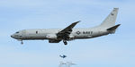 169000 @ KPSM - TALON814 over the numbers as GOTHAM8 does a 360 in the downwind pattern - by Topgunphotography