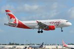 C-FYJH @ KMIA - Rouge A319 landing in MIA - by FerryPNL