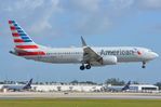 N302SS @ KMIA - American B738M over the runway - by FerryPNL