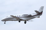 N686QS @ KLAX - NetJets Cessna 560XL Citation XLS on approach to LAX. Seen from the terrace of the Proud Bird restaurant - by Van Propeller
