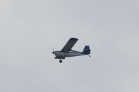 N32DH - Flying high over farm fields near St. Albans Bay, Vermont on a cloudy day. - by Robert Saltter