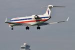 N501BG @ KORD - American Eagle CRJ7 Bombardier CL-600-2C10, N501BG, on approach KORD - by Mark Kalfas