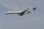N161GJ @ KORD - GoJet Airlines United Express CRJ7  Bombardier CL-600-2C10 on approach KORD - by Mark Kalfas