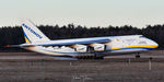 UR-82008 @ KPSM - Antonov touching down RW16 - by Topgunphotography