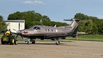 N902SM @ KDVN - Being moved on the General Aviation Ramp - by Floyd Taber