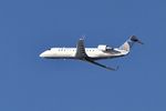 N930SW @ KORD - CRJ2 SkyWest/United Express BOMBARDIER INC CL-600-2B19, N930SW SKW5442 ORD-PIA - by Mark Kalfas