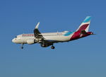 9H-EWB @ EGLL - Airbus A320-214 landing at London Heathrow. - by moxy