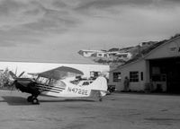 N4722E @ UNKN - This Aeronca Champ was used as a background prop for an episode of Perry Mason in 1965. It was in several shots taken at an unknow airport in the Segment of The Case of the Vanishing Victim, Season 9, Episode 17. - by Still frame from TV show