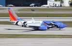 N280WN @ KFLL - SWA 737 Penguin zx - by Florida Metal