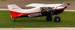 N205MX @ 8C4 - TIED DOWN IN THE GRASSY AREA - by Floyd Taber