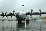 UR-09307 @ LOWW - On its way to the runway kicking up spray - by Hotshot