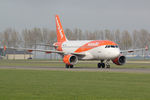 G-EZFW @ EHAM - at spl - by Ronald