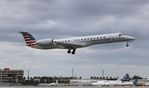 N655AE @ KMIA - ENY/AE E145 zx CHS-MIA - by Florida Metal