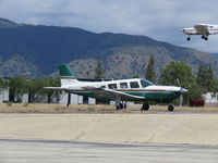N446RH @ 1938 - Taxiing while aircraft landing - by 30295