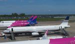 EC-OCT @ EGGW - At Luton Airport ready for boarding - by Chris Holtby