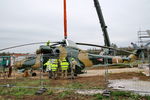 005 - Displayed as a memorial on the road leading to the former Szentkirályszabadjai Airport. It was given page number 005 in memory of the first Mi-24 combat helicopter to arrive in Hungary. Installation moments. - by Attila Groszvald-Groszi
