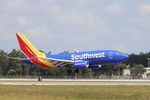 N233LV @ KRSW - Southwest Flight 759 arrives on Runway 6 at Southwest Florida International Airport following flight from Indianapolis International Airport - by Suncoast Spotter