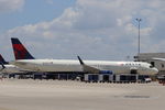 N535DN @ KRSW - Delta Flight 707 sits at the Gate at Southwest Florida International Airport preparing for flight to Boston-Logan International Airport - by Suncoast Spotter