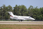 N345QS @ KRSW - NetJets Flight 345 departs Runway 6 at Southwest Florida International Airport enroute to Waterbury-Oxford Airport - by Suncoast Spotter
