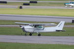 N5423E @ KPNS - SkyWarrior Skyhawk holds short of Runway 26 at Pensacola International Airport - by Suncoast Spotter