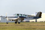 N6130V @ KLAL - Beech S35 Bonanza  C/N D-7797, N6130V - by Dariusz Jezewski www.FotoDj.com