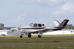 N8327D @ KLAL - Beech J35 Bonanza  C/N D-5411, N8327D - by Dariusz Jezewski www.FotoDj.com