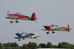 N5678C @ KLAL - RV airplanes taking off for large formation flight over Oshkosh grounds