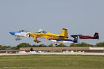 N67683 @ KLAL - RV airplanes taking off for large formation flight over Oshkosh grounds - by Dariusz Jezewski www.FotoDj.com