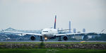 N811NW @ KBOS - Holding Short of RW22L - by Topgunphotography
