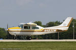 N483DM @ KOSH - Cessna T210L Turbo Centurion C/N 21060819, N483DM - by Dariusz Jezewski www.FotoDj.com