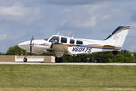 N6047S @ KOSH - Beech 58 Baron  C/N TJ-37, N6047S - by Dariusz Jezewski www.FotoDj.com