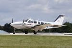 N6047S @ KOSH - Beech 58 Baron  C/N TJ-37, N6047S - by Dariusz Jezewski www.FotoDj.com