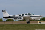 N6656W @ KOSH - Beech A36 Bonanza  C/N E-2075, N6656W - by Dariusz Jezewski www.FotoDj.com