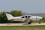 N7958R @ KOSH - Beech D55 Baron  C/N TE-692, N7958R - by Dariusz Jezewski www.FotoDj.com