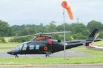 G-DAYD @ EGTR - Agusta Grand waiting for lift off at Elstree Aerodrome - by Chris Holtby