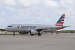 N657AW @ KRSW - American Flight 2365 taxis to the gate at Southwest Florida International Airport following flight from Philadelphia International Airport - by Suncoast Spotter