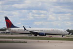 N895DN @ KRSW - Delta Flight 2226 taxis to the gate at Southwest Florida International Airport following flight from Minneapolis-St Paul International Airport - by Suncoast Spotter