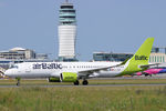 YL-ABM @ VIE - Rolling on runway 29 - by Hotshot