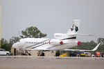 N900LN @ KRSW - Falcon 900LN sits on the Private Sky ramp at Southwest Florida International Airport - by Suncoast Spotter
