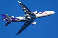 N642FE @ STAN - md11 fed ex cargo tramper leaving stansted in sky over bishops stortford a few years back i love the md-11 a great plane - by david knox