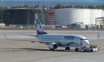 TC-TLI @ LTAI - Pushed back for take-off at Antalya Airport, Turkey - by Chris Holtby